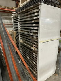 2 Metal multidrawer cabinets with some enamel magnets & plates without backs, cabinets measure 72" H