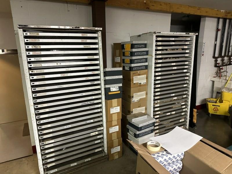 2 Metal multidrawer cabinets, 1 empty, 1 has enamel magnets & plates without backs, cabinets measure (1 of 5)