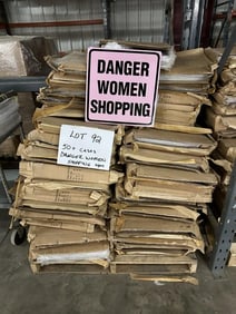50+ cases of DANGER WOMEN SHOPPING tin embossed signs, (16" X 16")