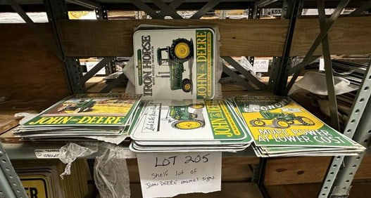 Approx. (4) enamel JOHN DEERE signs…..
