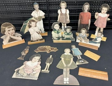 Lot of folk art family photo cutouts….