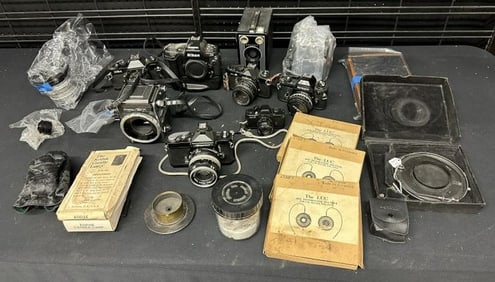 Lot of vintage cameras including Nikon 35mm with SLRs with lenses, Pentax Auto 110 kit, Kowa 6