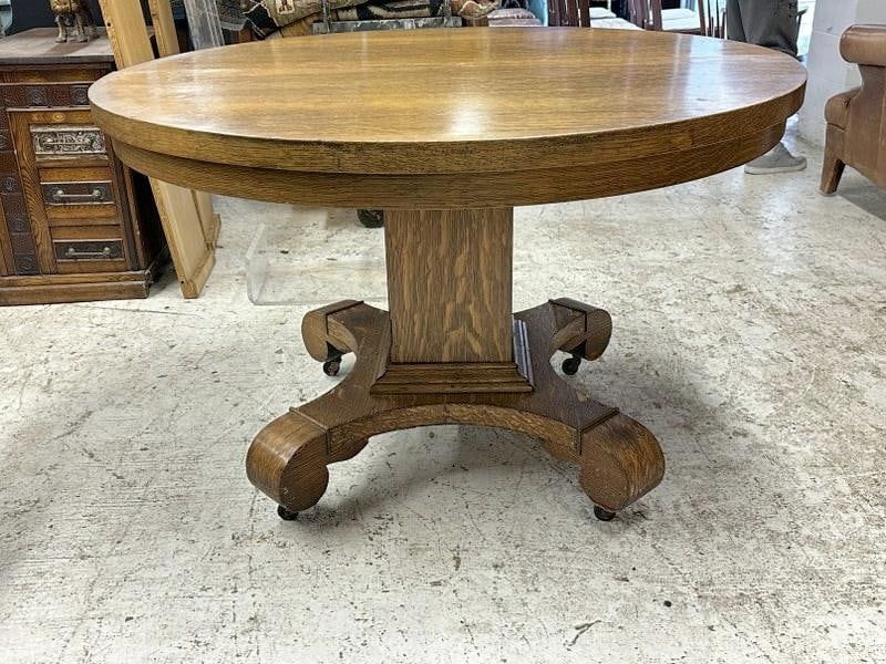 Circa 1900 quarter sewn oak pedestal base dining table, measures 48" across top x 31" high, ( comes (1 of 2)