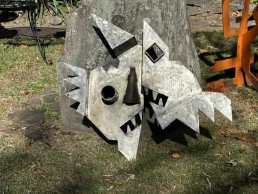 Maury Colow (1917-1993) Woodstock, N. Y. abstract steel hanging face wall sculpture, measures 35"