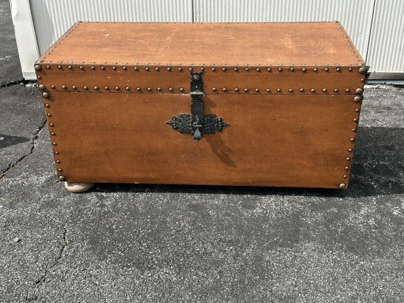 Nice decorative leather storage trunk with bun feet ( missing on foot, can put block on back ), has (1 of 3)