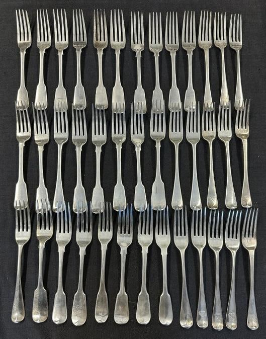 (39) early sterling dinner forks, some match, some are close, some with monograms of animals on (1 of 10)