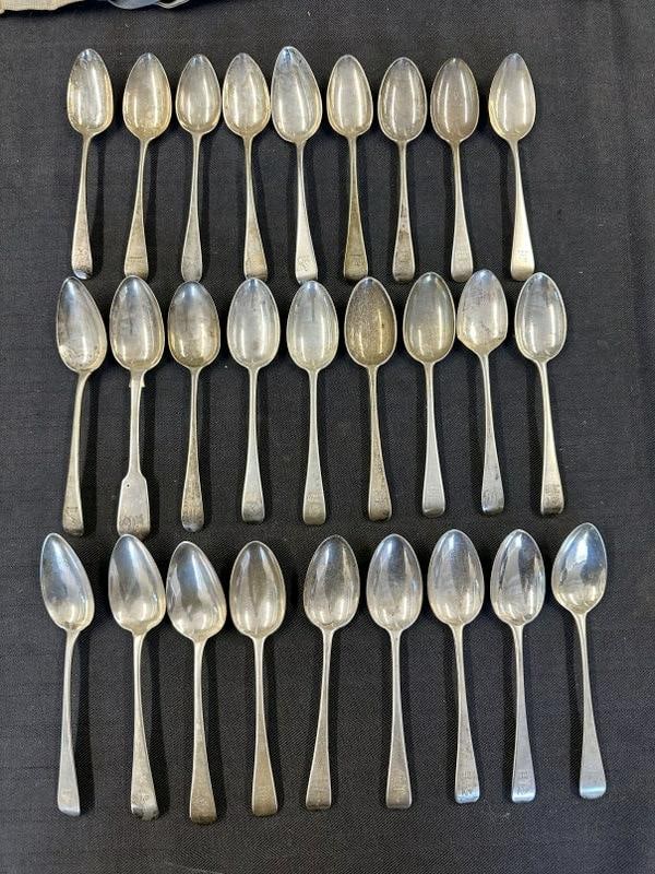 (27) large early spoons, some matching, some close, all monogrammed on handle tops, some with: (27) large early spoons, some matching, some close, all monogrammed on handle tops, some with animals. Some hallmarks pictured. The spoons measure approx. 7" long. Total weight is ( 30.30 troy ounces 