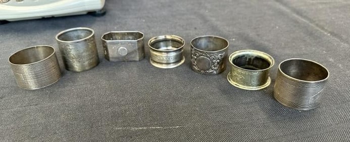 (7) sterling silver different napkin rings, total weight is ( 5.89 troy ounces ). From Hudson