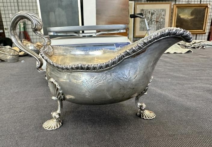 Georgian sterling gravy boat in nice condition, hallmarks as pictured, measures 7.75" across, weighs (1 of 7)