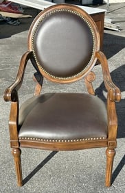Contemporary decorative armchair with leather-like upholstery, very clean, measures 24" W x 39" H.