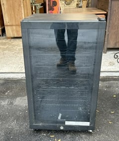 Fridgedaire black wine cooler from nice home, works fine, measures 19.5" W x 21" D x 32" H.