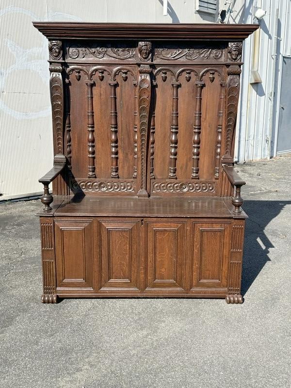 Early oak deacon's bench with carved heads on top and nice carvings throughout with raised panels on (1 of 9)