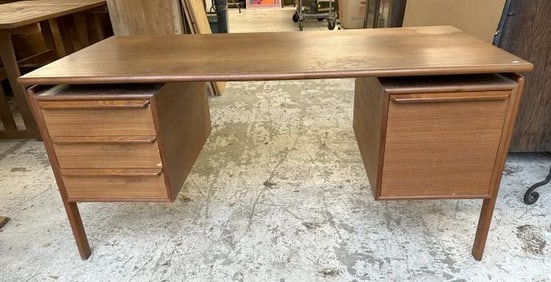 Danish modern teak desk, maker unknown, a little veneer damage to a drawer and light staining on
