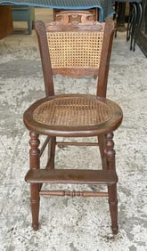 Victorian child's chair, arms missing, with foot rest, cane all good, measures 34.5" H.