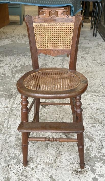 Victorian child's chair, arms missing, with foot rest, cane all good, measures 34.5" H. (1 of 1)