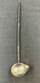 Early silver toddy ladle, with (1787) coin as pictured, handle is a twisted plastic like material,