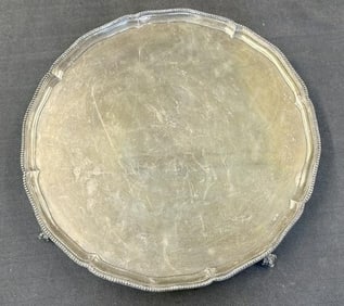 14" diameter early sterling tray with ball and claw feet, hallmarks as pictured, looks like (EI)