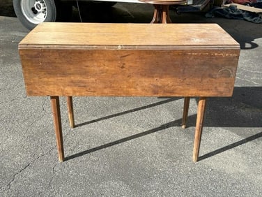 Early cherry drop leaf table in estate found condition, structurally sound, with wear to patina and