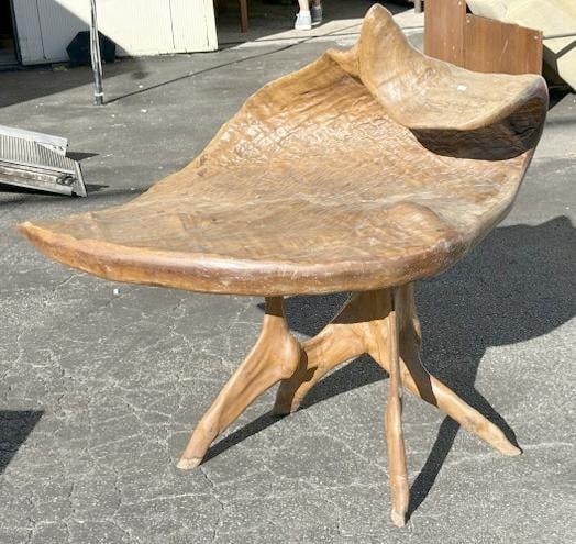 Unusual slab table with tree branch base, unsure of the wood, measures 36.5" H X 43" W x 26" D.: Unusual slab table with tree branch base, unsure of the wood, measures 36.5" H X 43" W x 26" D.