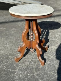 Victorian marble top oval table, hairline crack on marble, walnut base, measures 27" H x 22" W x 17"