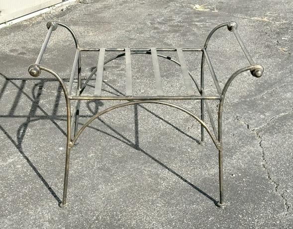 Decorative iron stool, no cushion, measures 27" W x 20" D and seat is 16" H.: Decorative iron stool, no cushion, measures 27" W x 20" D and seat is 16" H.