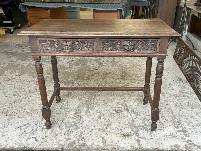 Circa 1910 oak 2 drawer table with carved lion heads on the drawers, structurally sound, nice old (1 of 4)