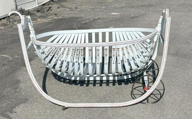 19th c  bentwood repainted slatted cradle, structurally sound, wheels intact, measures 46" long  x (1 of 2)