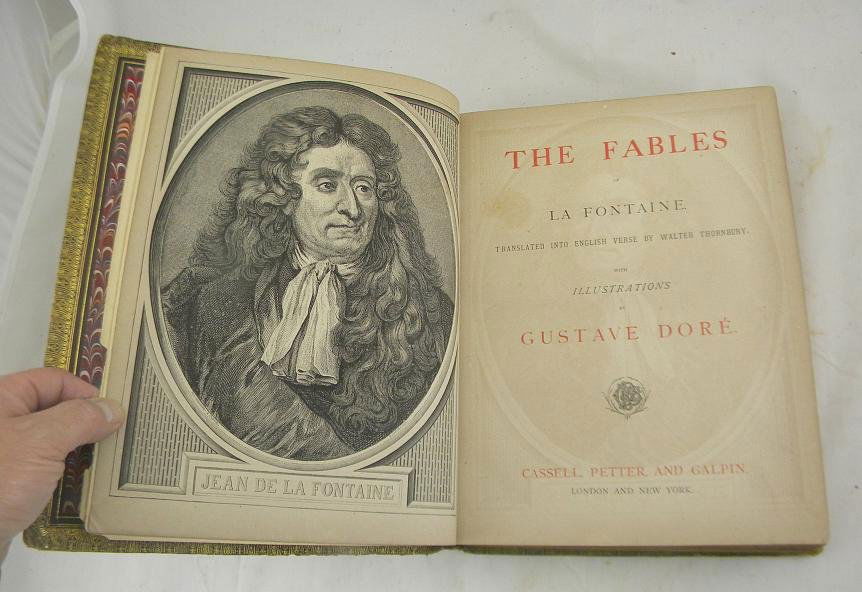 The Fables of La Fontaine with illustrations by Gus: The Fables of La Fontaine with illustrations by Gustave Dore. Nice overall inside condition, outer boards have a good amount of wear, spine is tight.