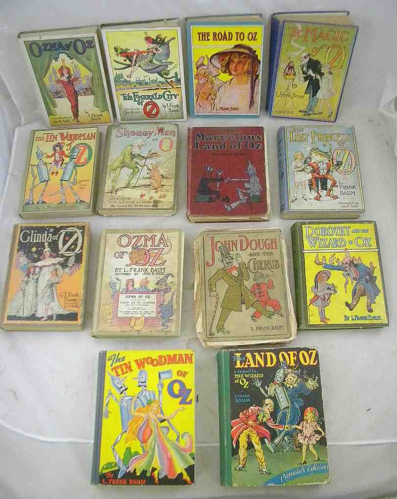 14 Early L FRANK BAUM "OZ" Books 2 w/Dust Jackets: 14 Early L FRANK BAUM "OZ" Books 2 w/Dust Jackets, some in better condition than others, one in poor condition, the 2 with dust jackets are pictured, THE EMERALD CITY OF OZ & OZMA OF OZ.