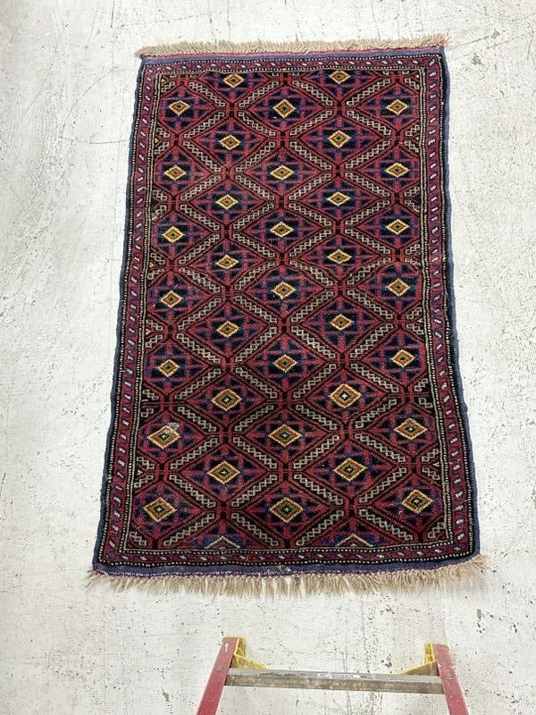 Handmade wool oriental scatter rug, nice and clean, measures 55" x 33". (1 of 2)