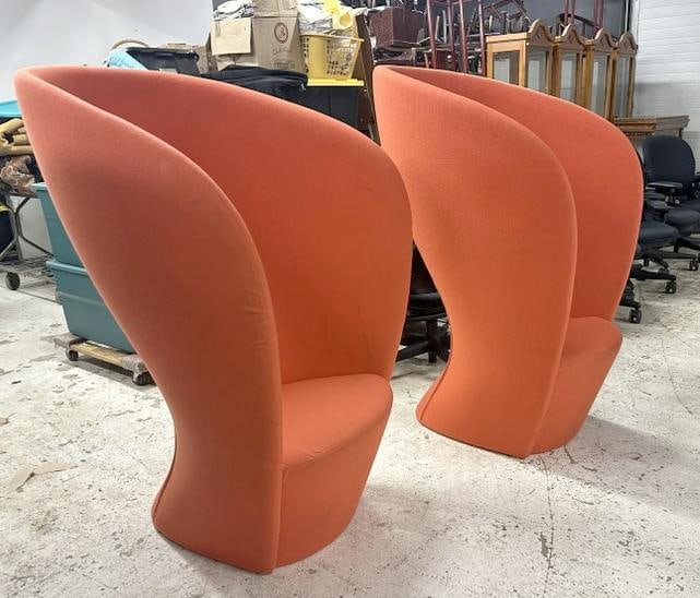 Pair HIGHTOWER Shelter Lounge Chairs, orange fabric, structurally sound, some light staining that: Pair HIGHTOWER Shelter Lounge Chairs, orange fabric, structurally sound, some light staining that may come out, zipper backs, measures 53" high x 34" wide x 32" deep. All the high end Designer and Mod