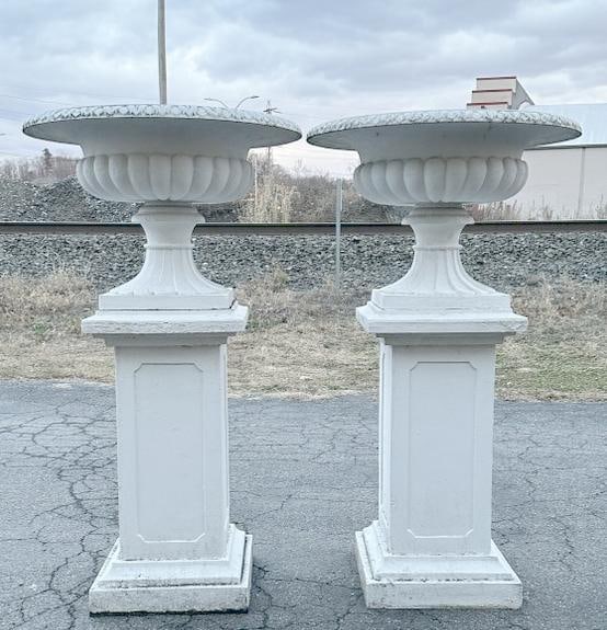 Fabulous pair cast iron garden urns, (2) part with paneled sides base. Nice old crusty dry white (1 of 3)