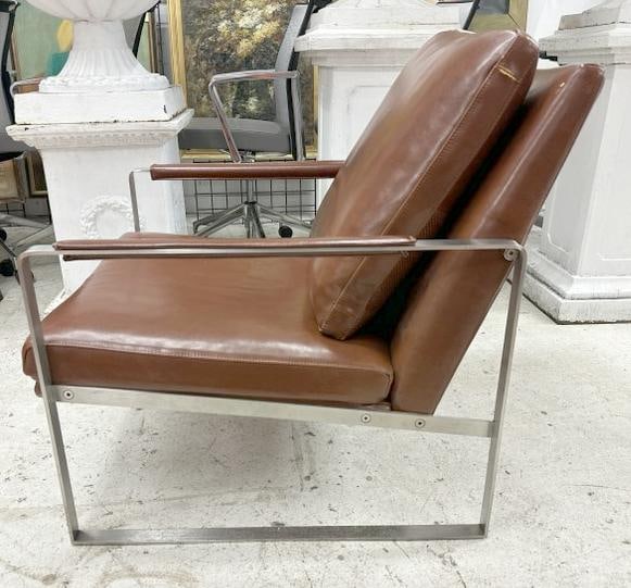 CAMERICH leather and chrome lounge chair, loose back cushion, some scuffs to leather in spots,: CAMERICH leather and chrome lounge chair, loose back cushion, some scuffs to leather in spots, structurally sound, good looking chair, measures 28" wide arm to arm x 31" deep front to back x 30" high.