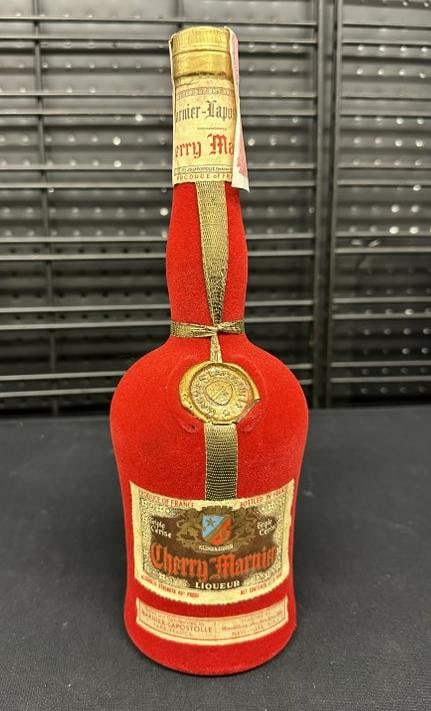 CHERRY MARINIER Cherry Brandy in sealed bottle, all labels and tax seal intact. 48 Proof, BOTTLED IN: CHERRY MARINIER Cherry Brandy in sealed bottle, all labels and tax seal intact. 48 Proof, BOTTLED IN FRANCE. All the alcohol and wine came from a local estate, they are JUST as we found them, all seal