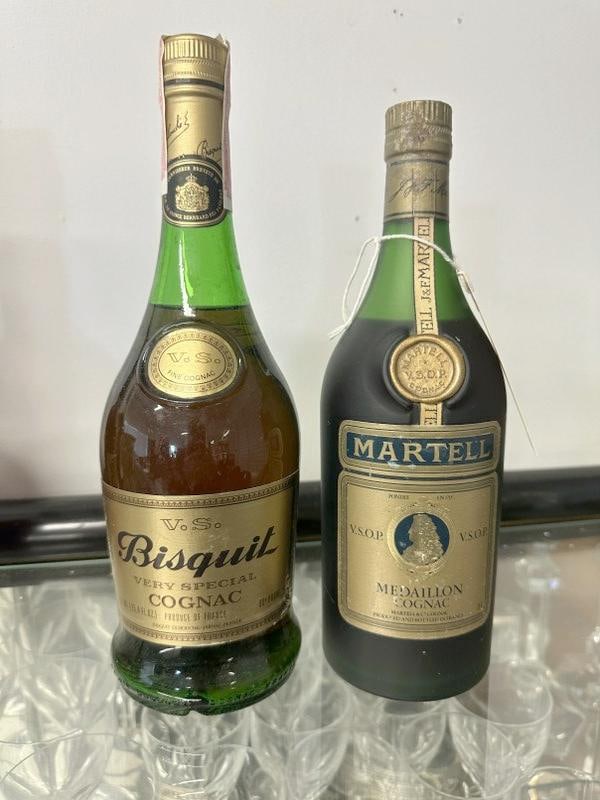 (2) bottles of cognac - MARTELL COGNAC MEDAILLON VSOP, sealed bottle, labels intact, bottled in: (2) bottles of cognac - MARTELL COGNAC MEDAILLON VSOP, sealed bottle, labels intact, bottled in France. AND a bottle of vintage Bisquit, 750 Mil., 80 proof. All the alcohol and wine came from a local 