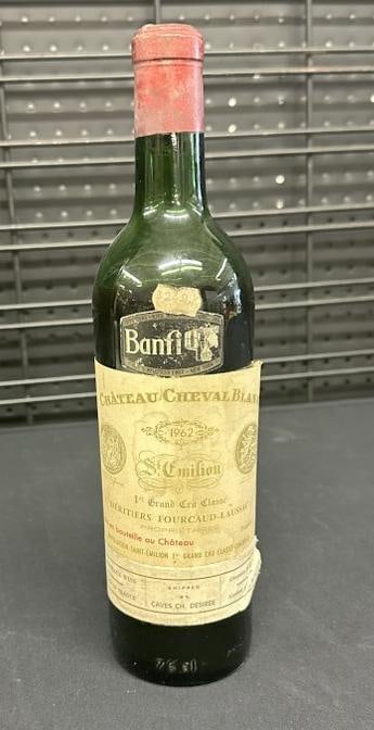 1962 bottle CHATEAU CHEVAL BLANC, has evaporation, labels intact but some coming loose ( has a: 1962 bottle CHATEAU CHEVAL BLANC, has evaporation, labels intact but some coming loose ( has a 324.95 price tag ), All the alcohol and wine came from a local estate, they are JUST as we found them, al