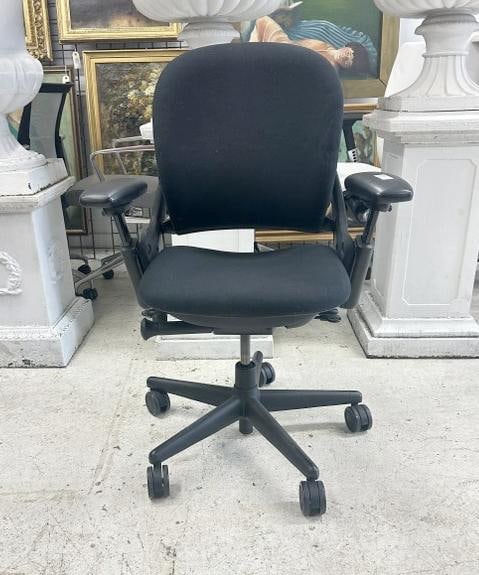 SteelCase Leap chair, black, fabric & pivot arms, in very nice functional condition. From a major: SteelCase Leap chair, black, fabric & pivot arms, in very nice functional condition. From a major Times Square Corporation, who closed their offices….just as we found them, may be a scuff here or th