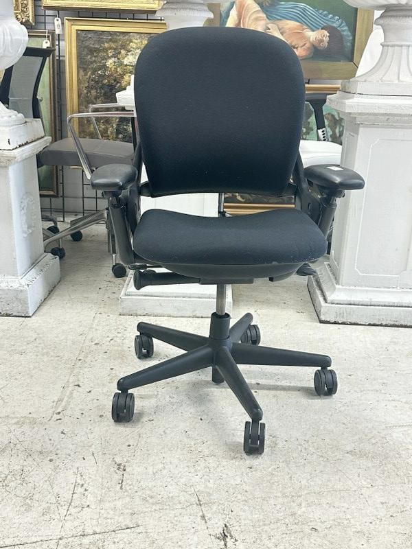 SteelCase Leap chair, black, fabric & pivot arms, in very nice functional condition. From a major: SteelCase Leap chair, black, fabric & pivot arms, in very nice functional condition. From a major Times Square Corporation, who closed their offices….just as we found them, may be a scuff here or th