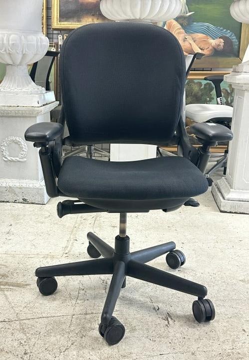 SteelCase Leap chair, black, fabric & pivot arms, in very nice functional condition. From a major: SteelCase Leap chair, black, fabric & pivot arms, in very nice functional condition. From a major Times Square Corporation, who closed their offices….just as we found them, may be a scuff here or th