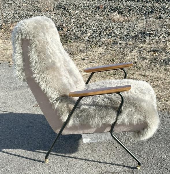 Wonderful Mid Century style armchair with furry cushion attached, wood arms and black metal legs,: Wonderful Mid Century style armchair with furry cushion attached, wood arms and black metal legs, wonderful form…..structurally sound, and in nice condition. Measures 27" across arm to arm. All the 