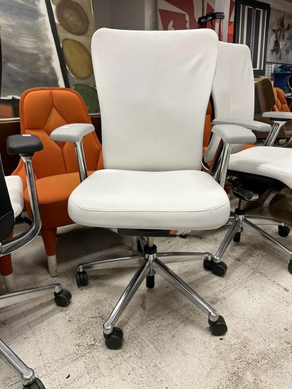 HAWORTH high end swivel office task chair, with white leather seat and back, fine condition, with: HAWORTH high end swivel office task chair, with white leather seat and back, fine condition, with little use. ( back covers are over mesh backs ), All the high end Designer and Modern furniture comes