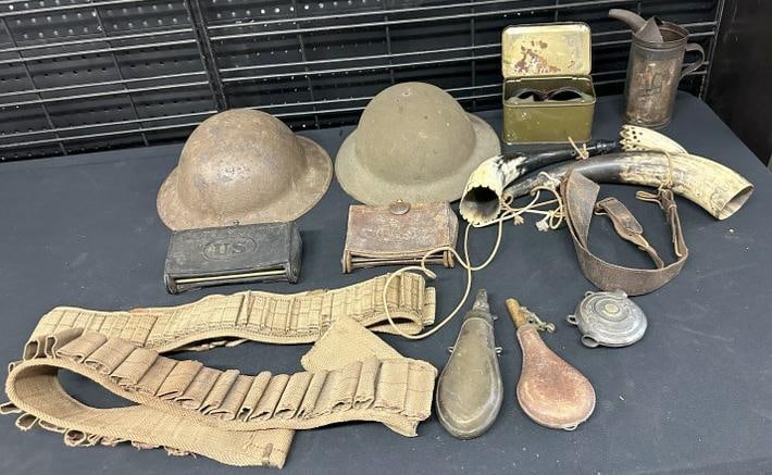 Military lot found in Hudson Valley estate, ammunition belts, leather pouches, (2) WW I helmets,: Military lot found in Hudson Valley estate, ammunition belts, leather pouches, (2) WW I helmets, black powder flasks, hirns, etc. Just how we found it, good lot for a dealer to sort out…