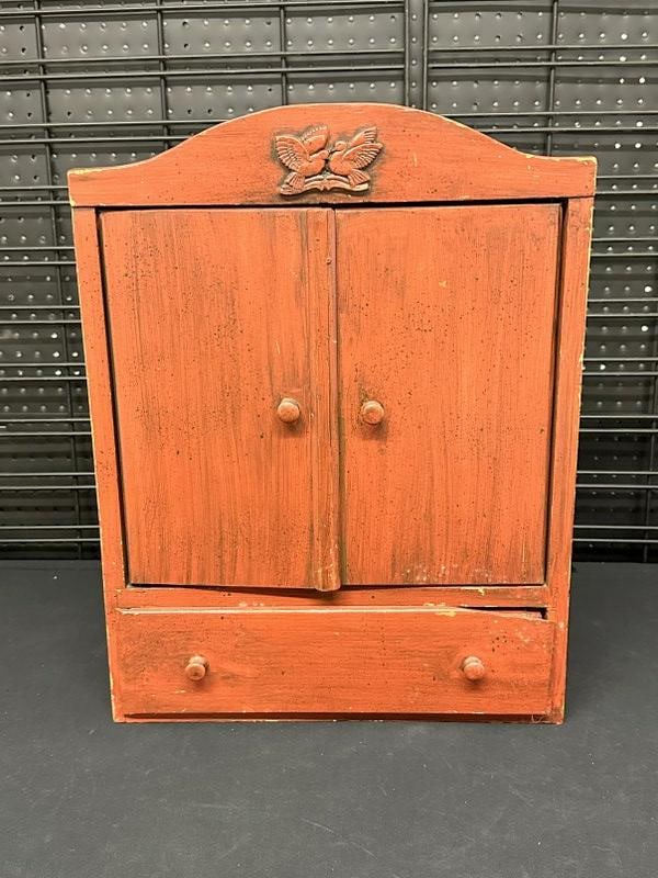 Small display cabinet with (2) doors and (1) drawer, was probably antiqued finish in the 60's, small (1 of 3)