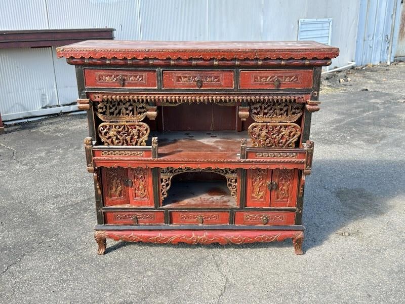 Chinese intricate carved cabinet, in nice old reddish finish, structurally sound, nice carved sides: Chinese intricate carved cabinet, in nice old reddish finish, structurally sound, nice carved sides as well, measures 35.5" wide x 15" deep x 33" high. From one owner estate collection of Asian and re