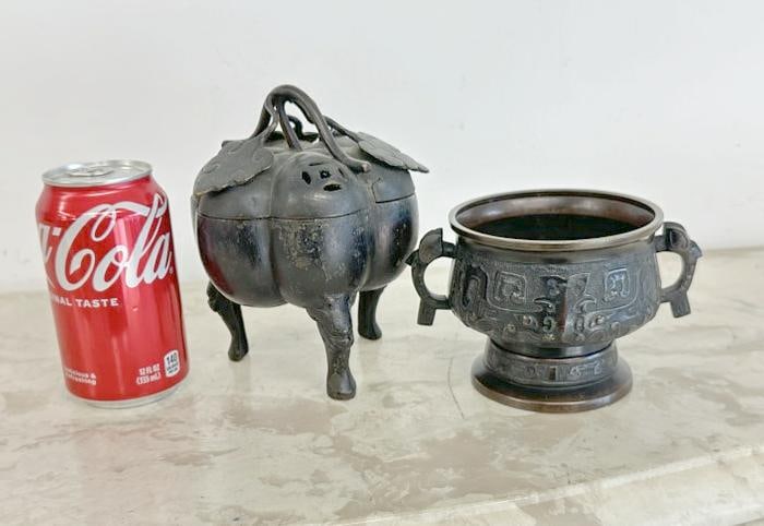 (2) Asian bronze censers, one has lid with leaves on top, with small crack on lid, measures 6.25" (1 of 7)