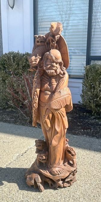 49" high caved Asian statue of Man with Foo Dogs on base and figures on his shoulder, nice estate (1 of 4)