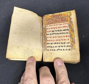 Early small hand written ( Ethiopian ? ), prayer book (?) on vellum, has wood outer boards, one