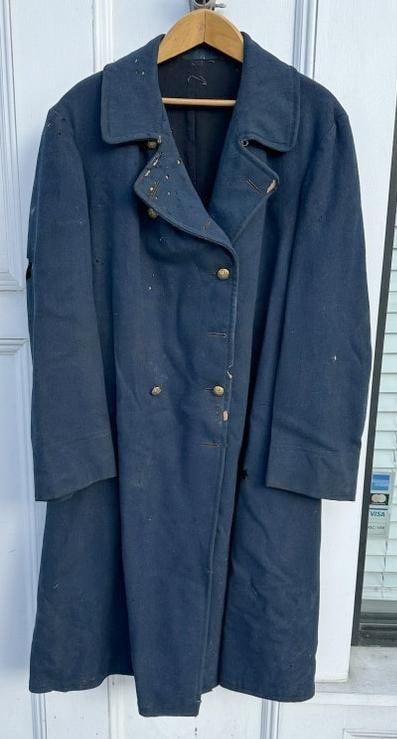 Civil War Union long jacket from estate in the Hudson Valley, some buttons intact, some missing, has: Civil War Union long jacket from estate in the Hudson Valley, some buttons intact, some missing, has moth holes from being stored away for years. Just as it was found, measures approx. 46" from top to