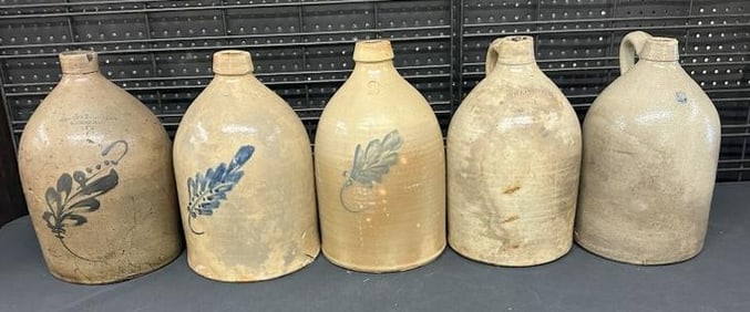 (5) 2 gallon stoneware jugs, (3) decorated with blue, all have damage, some worse than others, all