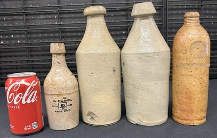 (4) stoneware beer bottles including L. PABST, chips on all, just as we found them.